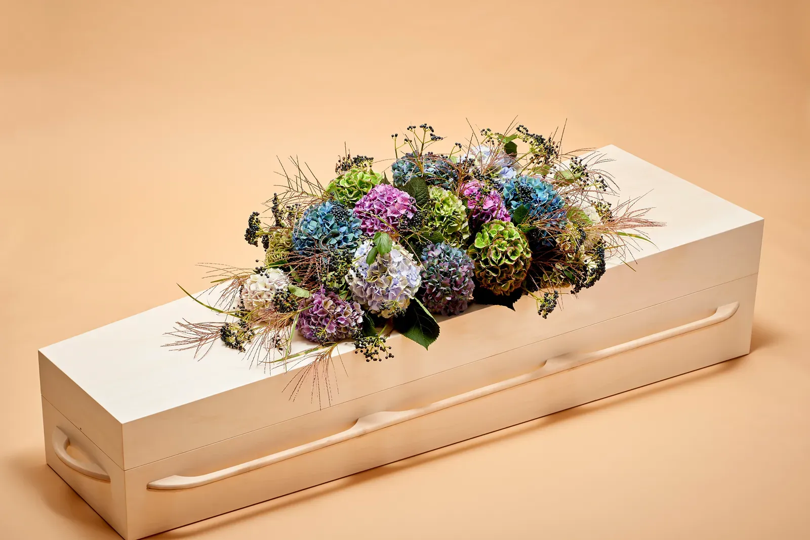 Kistbedekking Ontroering, bloemen voor op de kist voor de uitvaart